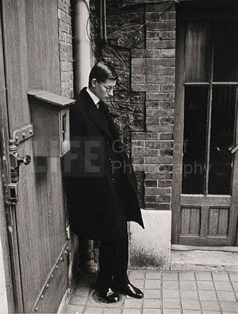 Yves St. Laurent after Attending Christian Dior's Funeral , 1957